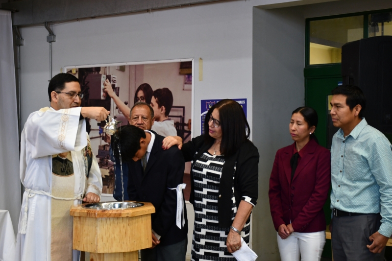 Cien personas recibieron el Sacramento del Bautismo y la Primera Comunión en Don Bosco Calama
